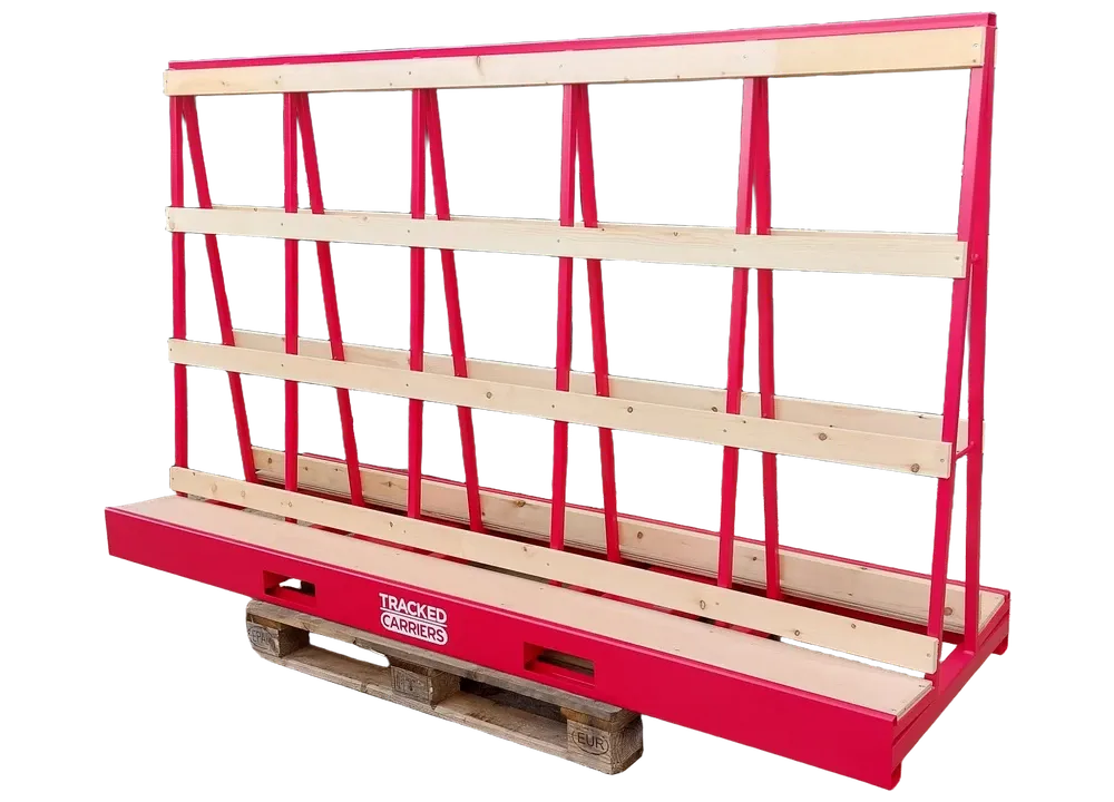 Cadre miroitier rouge à montants inclinés et lisses en bois, posé sur une palette.