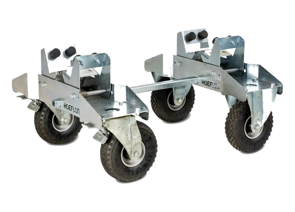 Chariot de transport Jib HOEFLON en acier galvanisé : deux berceaux sur roulettes reliés par une barre d'écartement.